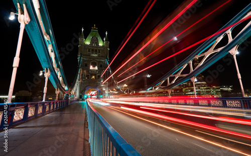 Light trails produced by busses and cars on the Tower Bridge in London.