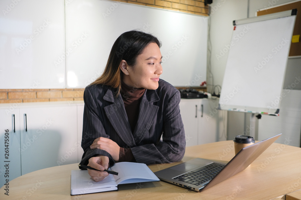 Businesswoman working at the computer in the workplace. Businesswoman working at the computer in the workplace.
