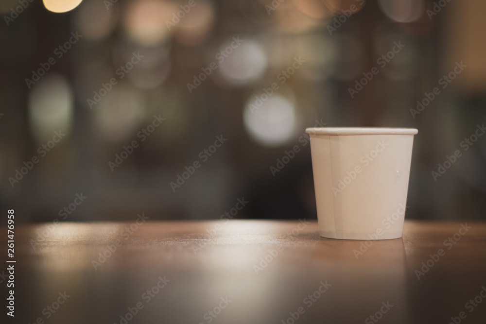 Fototapeta premium wooden table on light bokeh background in the restaurant