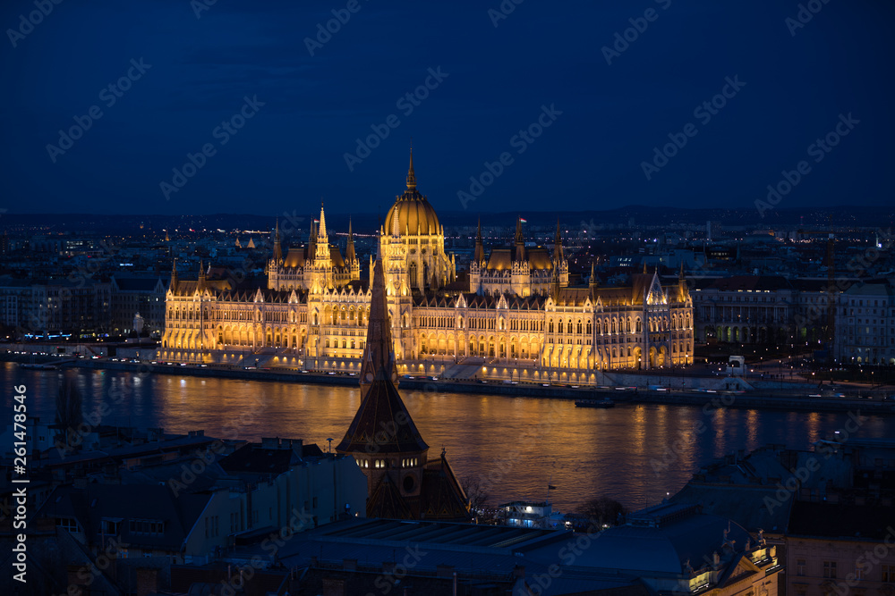 Night view of famous Hungarian parliament building with Danude river