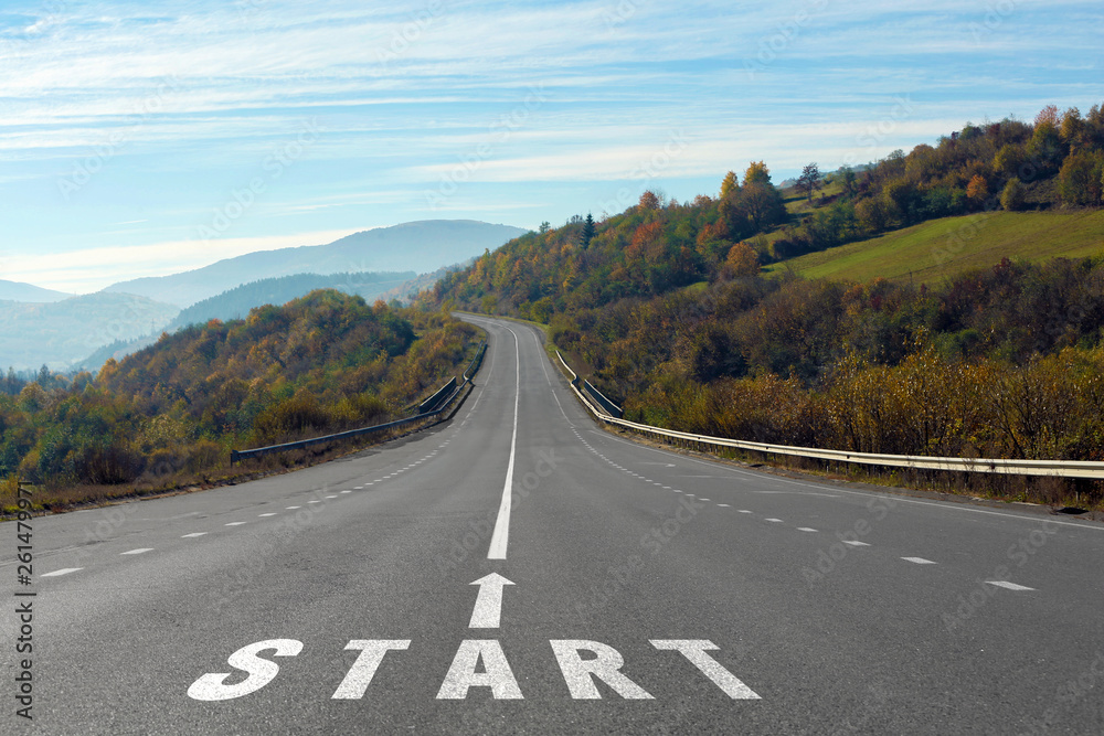 Obraz premium Landscape with asphalt road leading to mountains