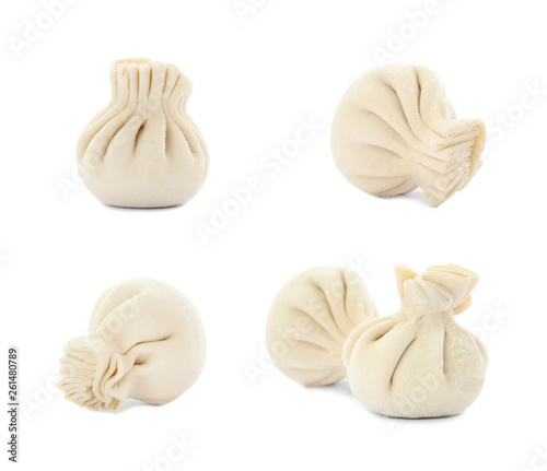Set of delicious raw dumplings on white background