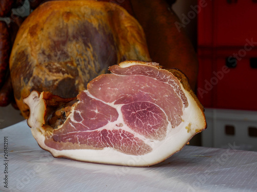 Traditional  Hungarian pork ham close up shot on a small Transylvanian towns market.  photo