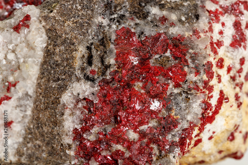 Macro stone mineral Cinnabar on a white background