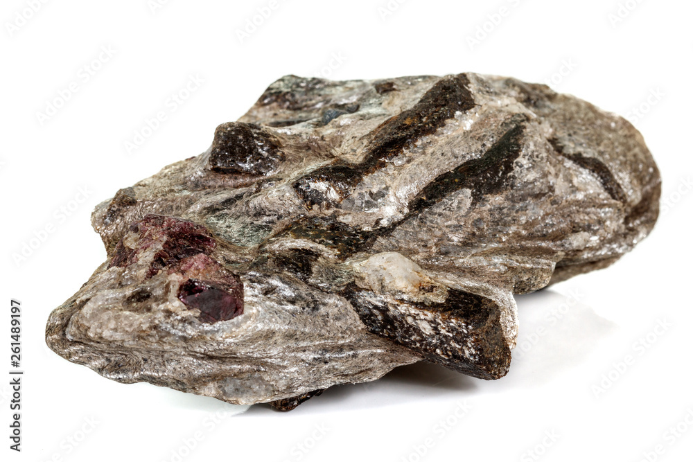 Macro stone Garnet mineral in rock on a white background