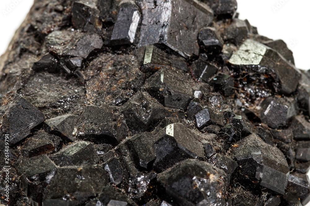 Macro stone mineral Melanite on a white background Macro stone mineral Melanite on a white background