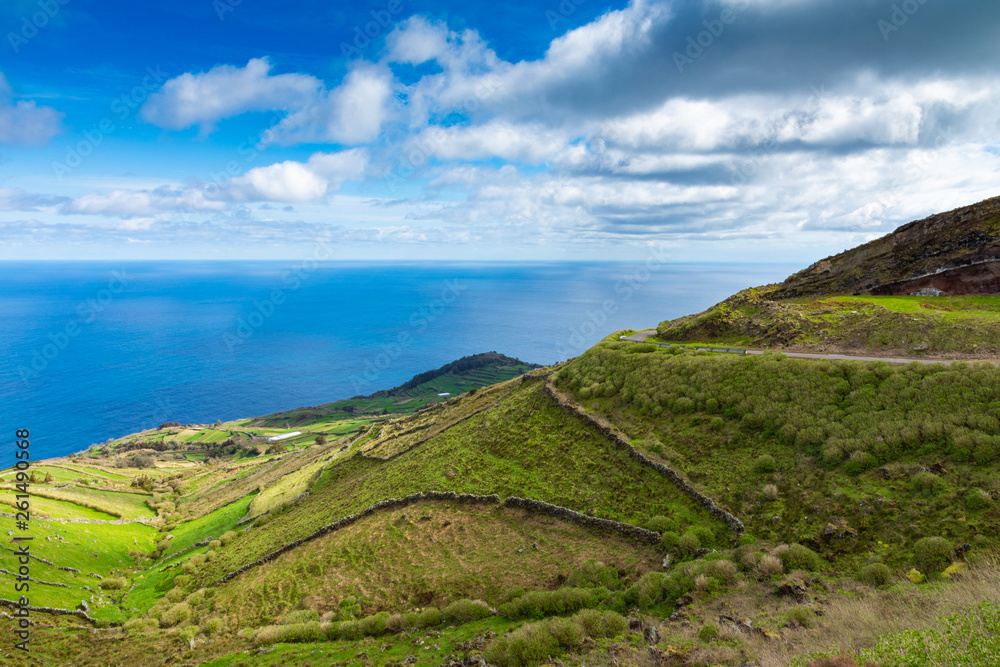 Hill of farm fields in the Corvo island in Azores, Portugal. Hill of farm fields in the Corvo island in Azores, Portugal.