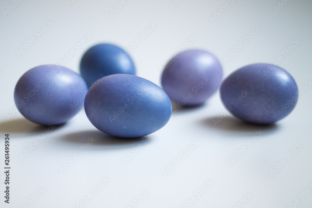 painted eggs on a light purple background Easter painted eggs on a light purple background Easter
