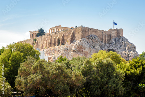Acropolis of Athens in summer, Greece. It is a top landmark of old Athens. Scenic view of the Acropolis hill with Ancient Greek ruins in the Athens center. Remains of the antique Athens city. 