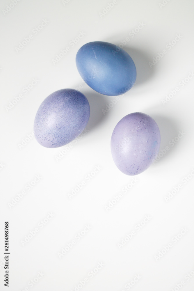 painted eggs on a light purple background Easter painted eggs on a light purple background Easter