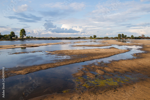 Fototapeta Naklejka Na Ścianę i Meble -  shallow river reflection of the sky