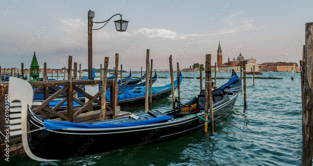 Romantic  Venice gondolas parking on grand canal