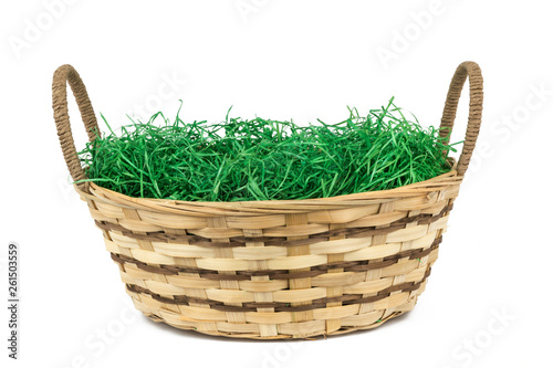 easter basket with grass isolated on white background