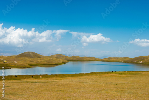 Osh, Kyrgyzstan - Aug 19 2018: Tulpar Kol Lake in Alay Valley, Osh, Kyrgyzstan. © beibaoke
