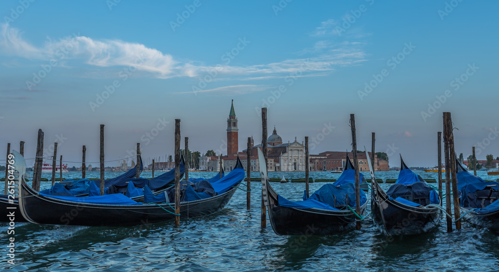 Romantic  Venice gondolas parking on grand canal