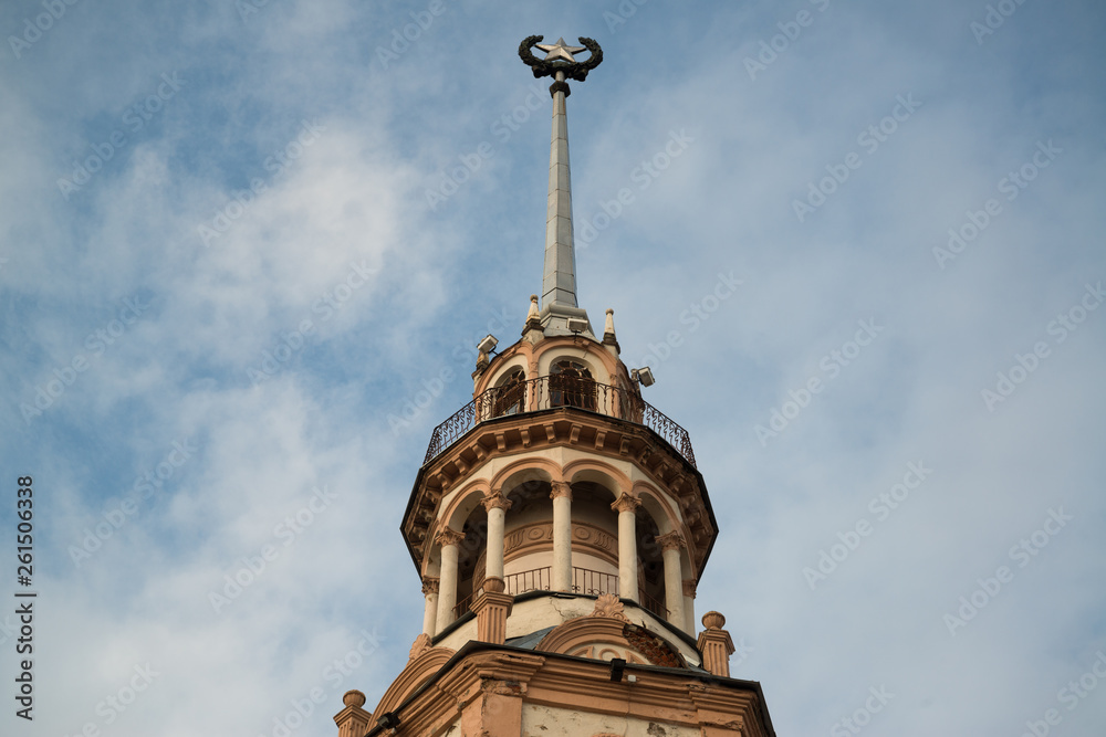Old historical beautiful building with tower on Kamunistycnaja street in Minsk, Belarus