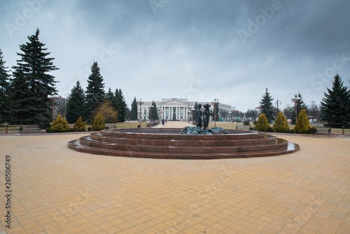 Central square of Molodechno  Belarus with fountain and Molodechno Polytechnic State College