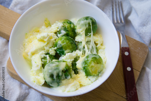 Brussel sprouts dressed with milk plus egg and cheese, omelette