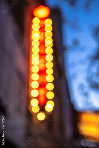 Rows of illuminated globes on a marquee or sign as often used at entrance to theatres and casinos photo