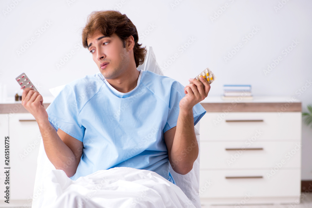 Young male patient lying on couch in hospital Young male patient lying on couch in hospital