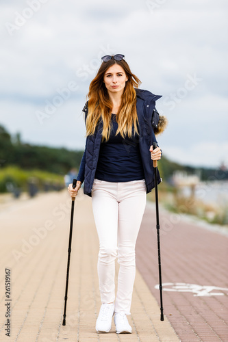 Nordic walking - young woman training