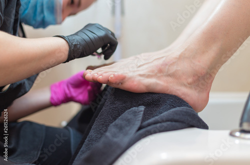 women doing pedicure in the salon. Beauty concept