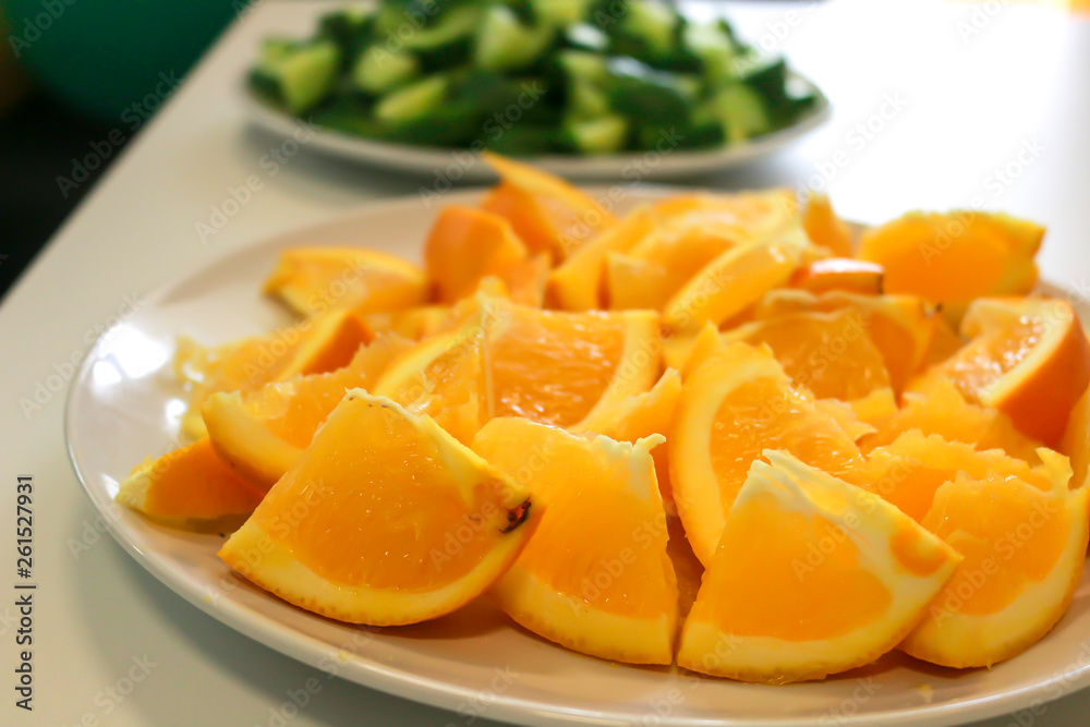 Green and yellow lemons served on plates