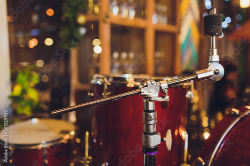 Drums conceptual image. Picture of drums and drumsticks lying on snare drum. Retro vintage instagram picture. photo