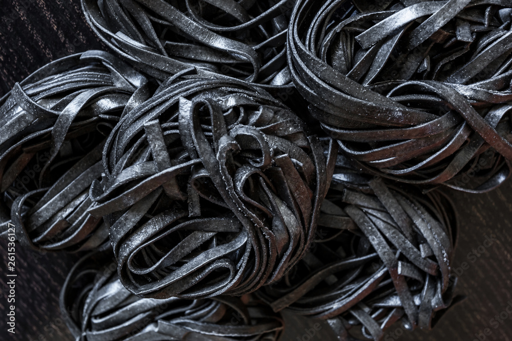 black pasta with cuttlefish ink. Pasta of durum wheat semolina with squid ink