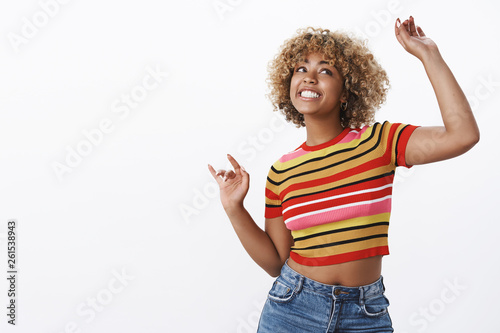 Εκτύπωση καμβά Girl dancing clumsy as having fun unbothered about opinions feeling natural on d