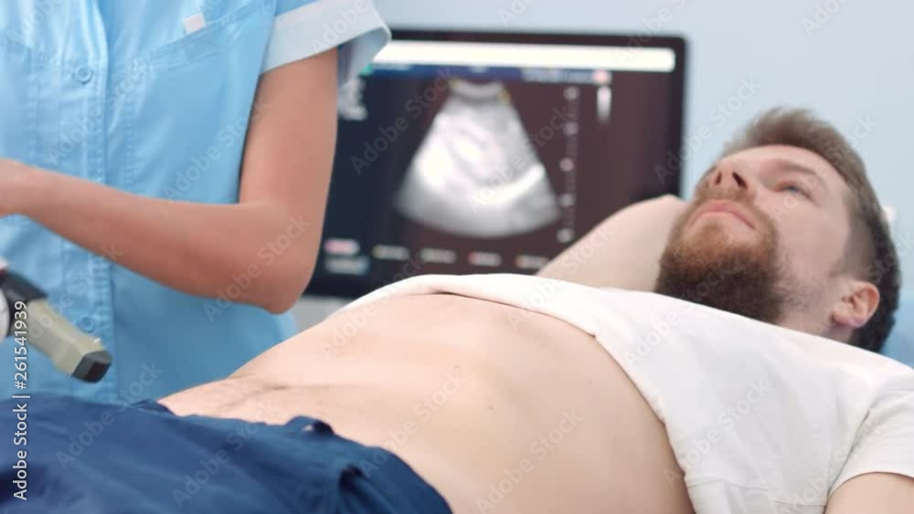 Positioning ultrasound transducer - kidney lithotripsy procedure Positioning ultrasound transducer - kidney lithotripsy procedure