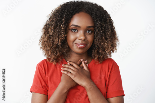 Fotografía Girl feeling grateful for sweet and generous gift holding palms together pressed