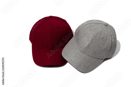 Red and grey texlile cap isolated on white photo