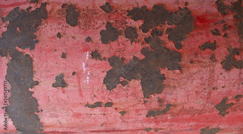 Pink vintage metal background with cracked paint. Flat lay  top view.