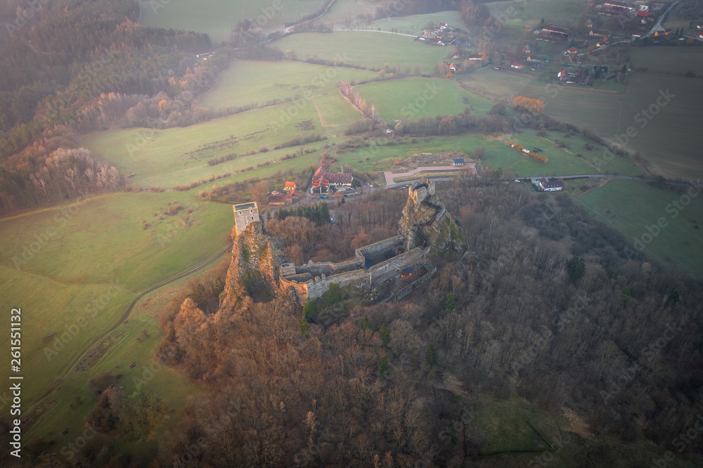 Trosky Castle is a castle ruin in Liberec Region, Czech Republic. Is on the summits of two basalt volcanic plugs. The castle is a landmark in the countryside known as Český ráj (Bohemian Paradise).