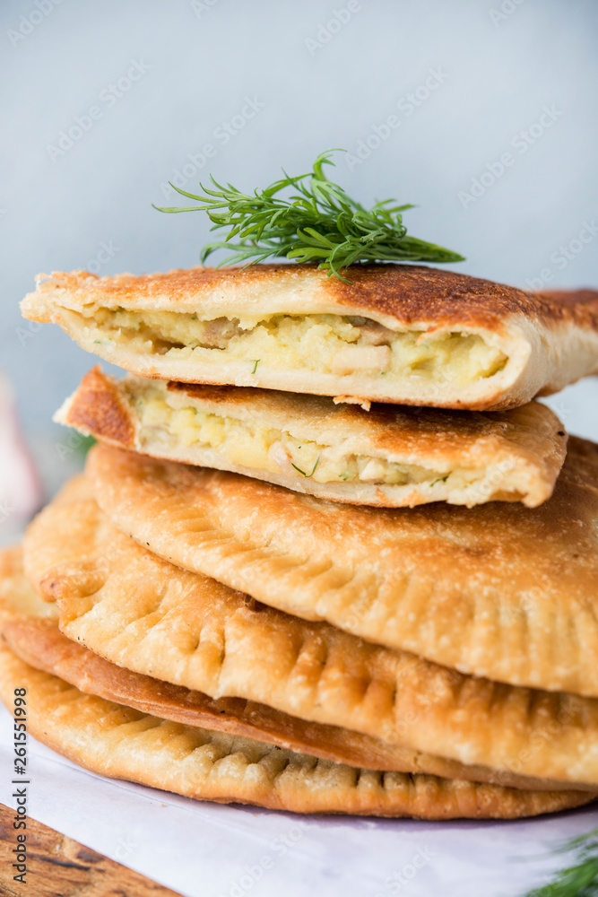 Homemade chebureks with potatoes. Of diet food. Pies with potatoes and mushrooms. Homemade chebureks with potatoes. Of diet food. Pies with potatoes and mushrooms.