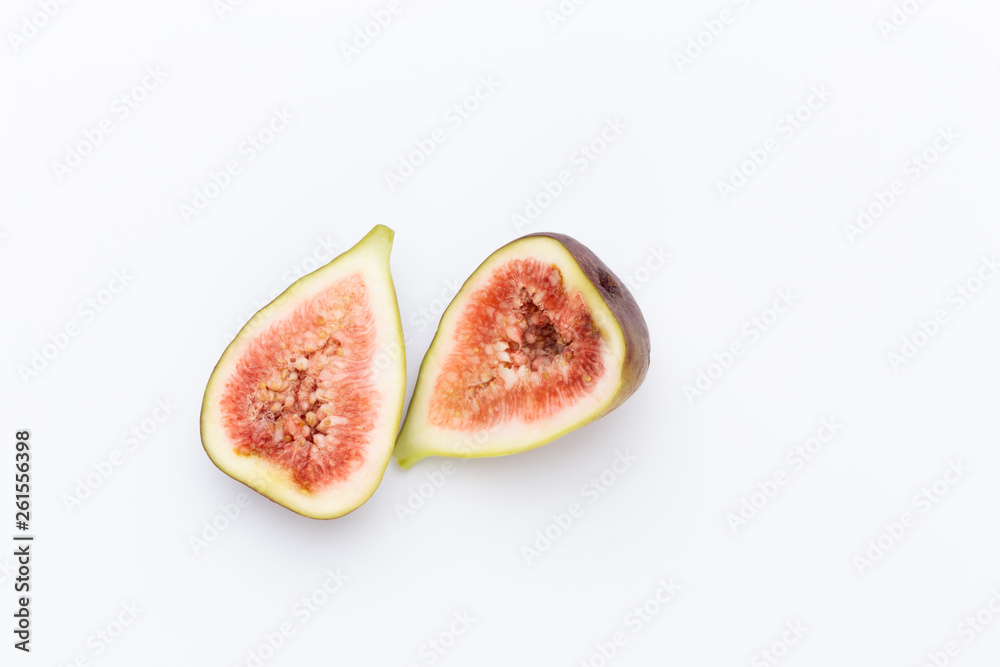 Fig fruits isolated on white background. Top view. Flat lay pattern Fig fruits isolated on white background. Top view. Flat lay pattern