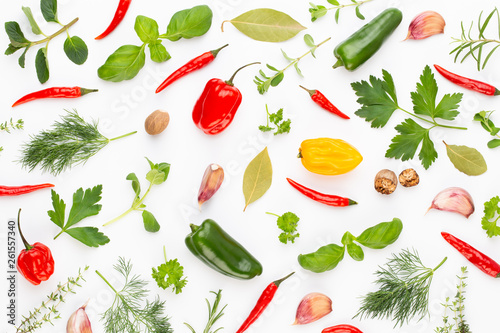 Fototapeta Naklejka Na Ścianę i Meble -  Spice herbal leaves and chili pepper on white background. Vegetables pattern. Floral and vegetables on white background. Top view, flat lay.
