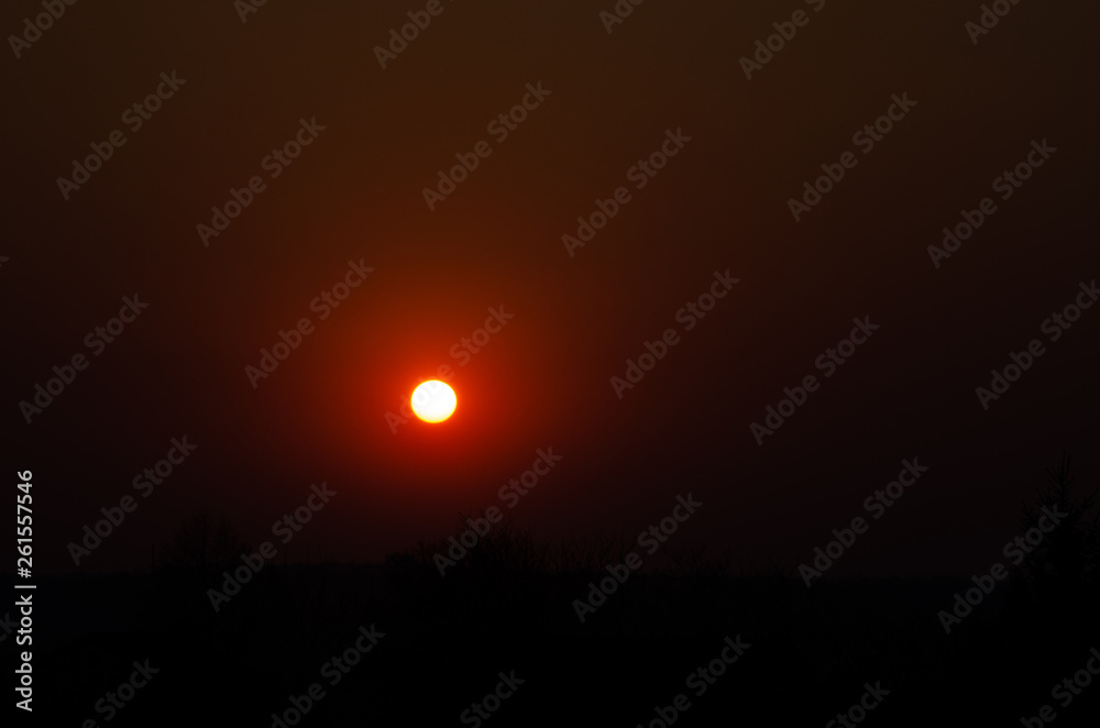 Incredible, beautiful, Bright sunset over the city. Gradient, the core of the sun. Beautiful sunset, red, orange Incredible, beautiful, Bright sunset over the city. Gradient, the core of the sun. Beautiful sunset, red, orange