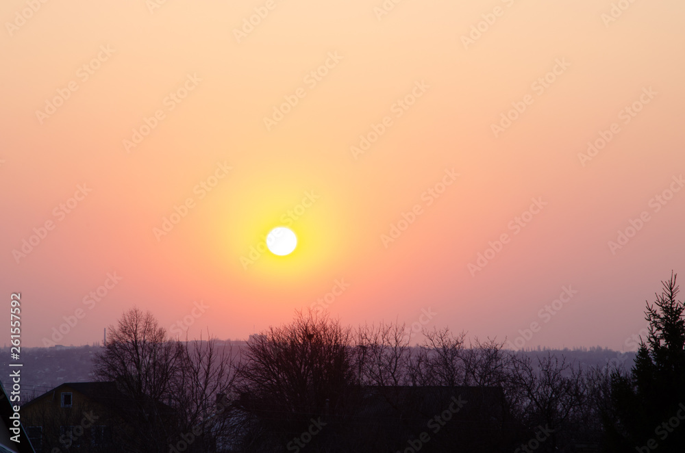 Incredible, beautiful, Bright sunset over the city. Gradient, the core of the sun. Beautiful sunset, red, orange Incredible, beautiful, Bright sunset over the city. Gradient, the core of the sun. Beautiful sunset, red, orange