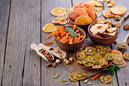 Mixed dried fruit chips, candied pumpkin slices, nuts and seeds with copy space