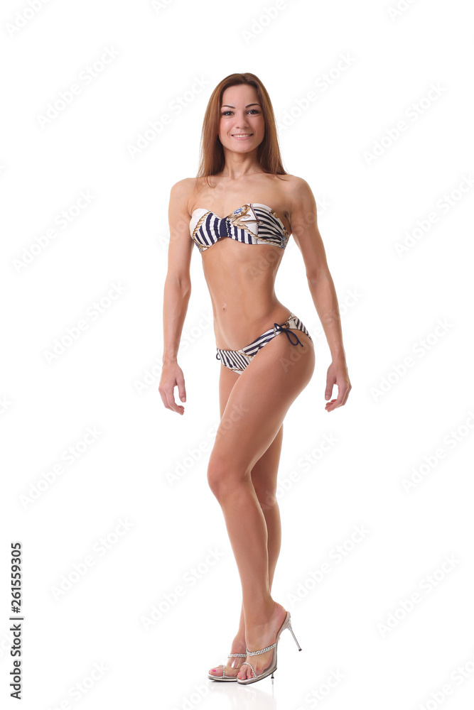 Fototapeta premium Young athletic girl in a bikini