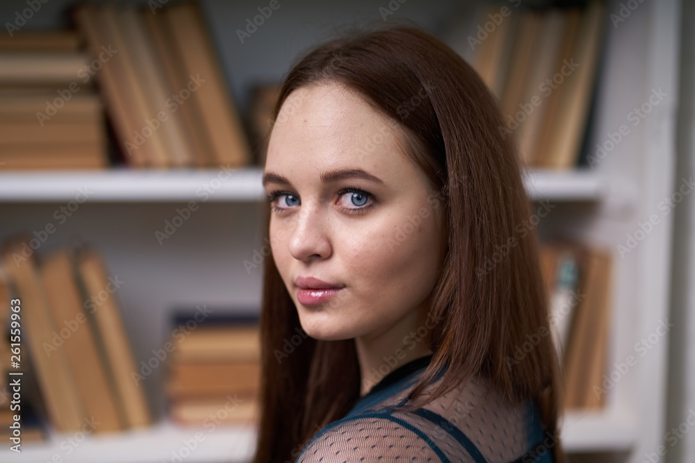 Pretty Female Student Surrounded by Library Books Pretty Female Student Surrounded by Library Books