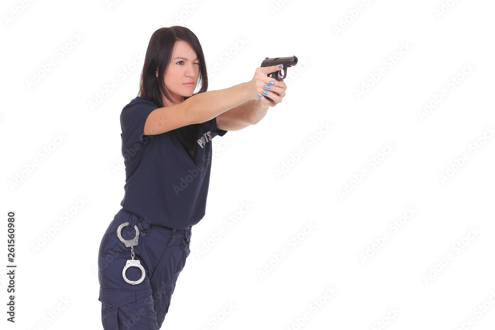 young woman police officer with a pistol young woman police officer with a pistol
