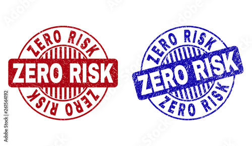 Grunge ZERO RISK round stamp seals isolated on a white background. Round seals with grunge texture in red and blue colors. Vector rubber overlay of ZERO RISK text inside circle form with stripes.
