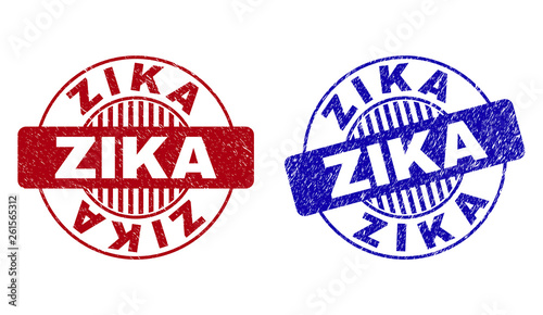 Grunge ZIKA round stamps isolated on a white background. Round seals with grunge texture in red and blue colors. Vector rubber imprint of ZIKA caption inside circle form with stripes.