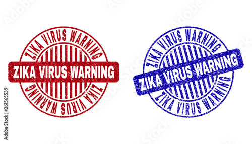 Grunge ZIKA VIRUS WARNING round stamp seals isolated on a white background. Round seals with grunge texture in red and blue colors.