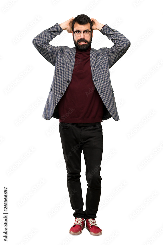 Handsome man with glasses frustrated and takes hands on head over isolated white background Handsome man with glasses frustrated and takes hands on head over isolated white background