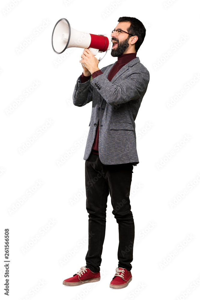 Handsome man with glasses shouting through a megaphone over isolated white background Handsome man with glasses shouting through a megaphone over isolated white background