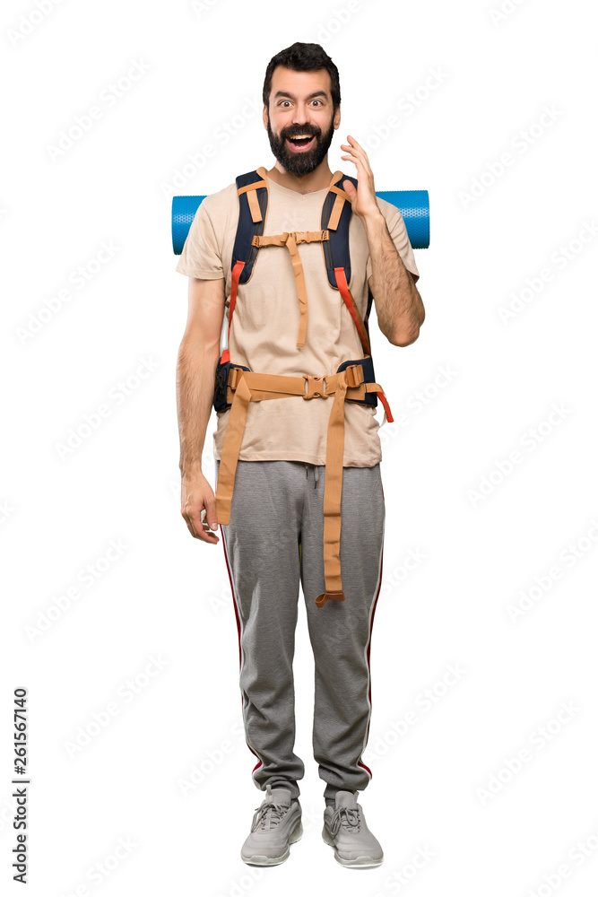 Hiker man with surprise and shocked facial expression over isolated white background Hiker man with surprise and shocked facial expression over isolated white background